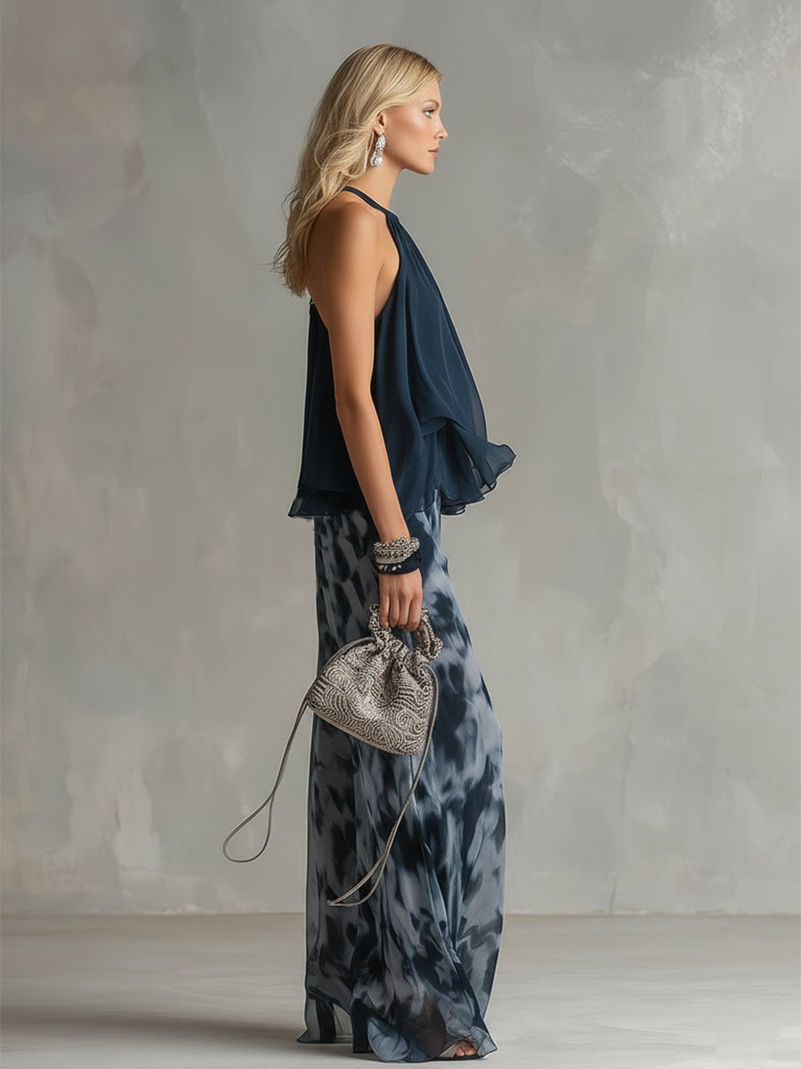 Ludovica - un elegante completo in chiffon composto da una camicetta con collo alto e pantaloni larghi a fantasia