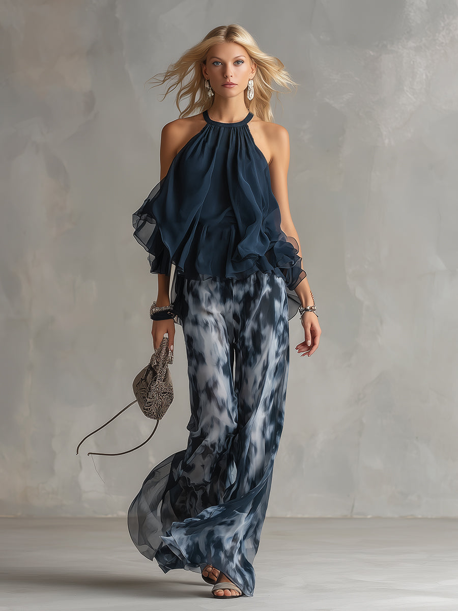 Ludovica - un elegante completo in chiffon composto da una camicetta con collo alto e pantaloni larghi a fantasia