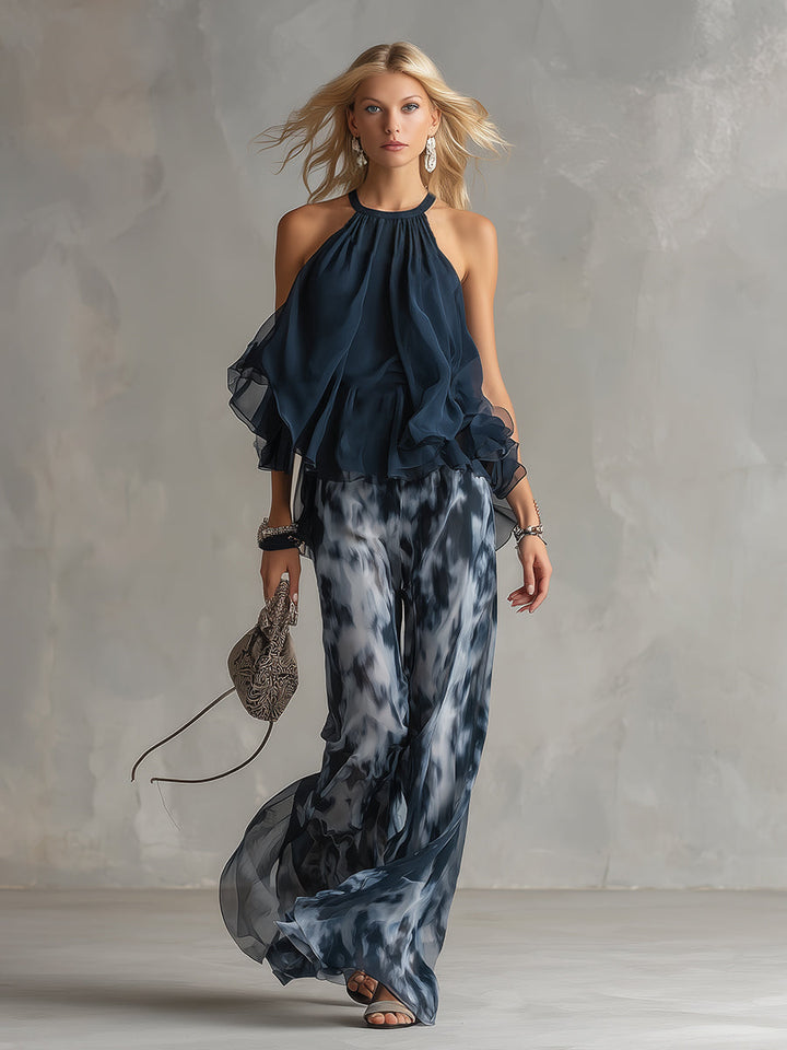Ludovica - un elegante completo in chiffon composto da una camicetta con collo alto e pantaloni larghi a fantasia