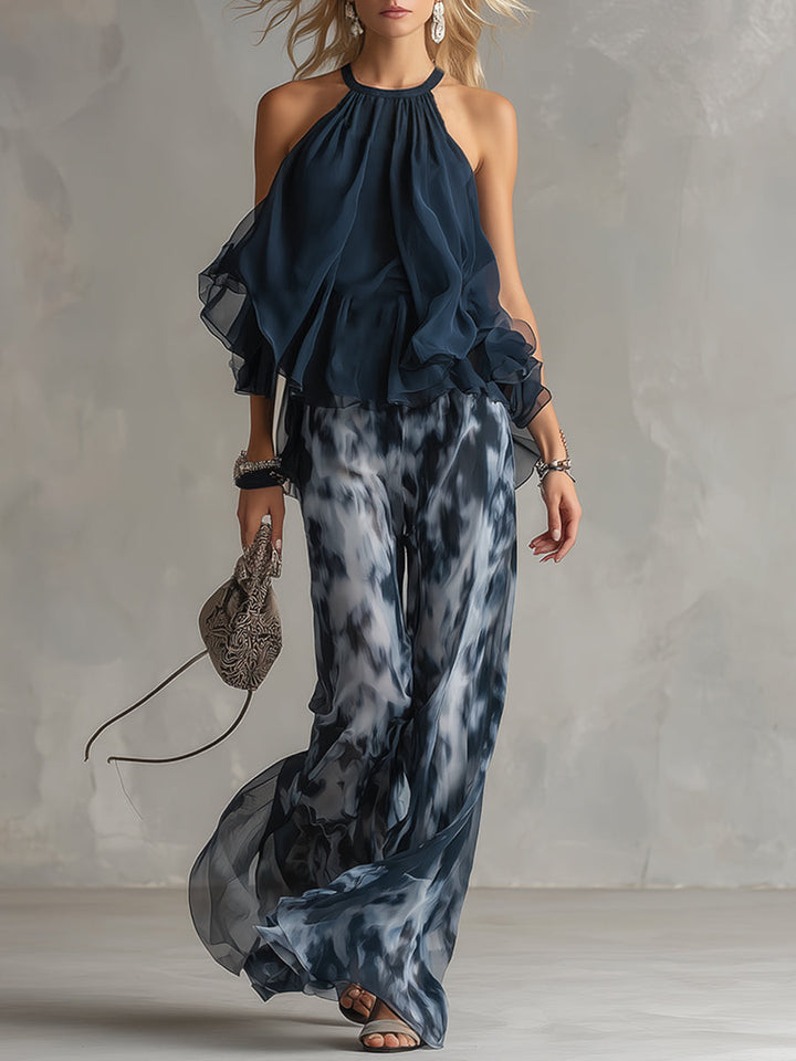 Ludovica - un elegante completo in chiffon composto da una camicetta con collo alto e pantaloni larghi a fantasia