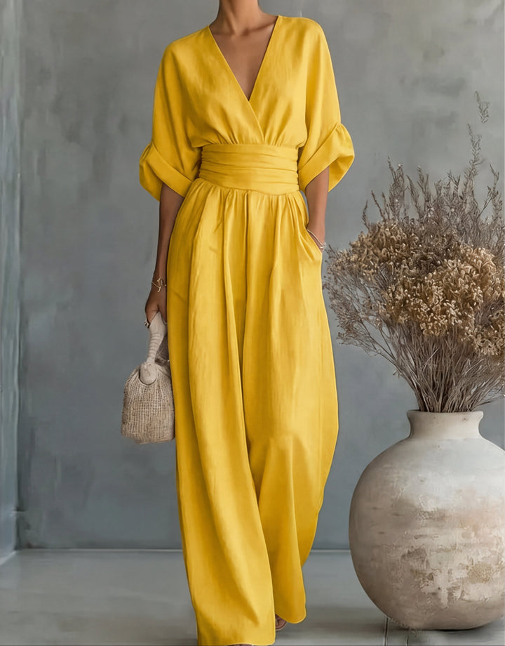 Daniela - Elegante tuta con scollo a V e pantaloni a zampa