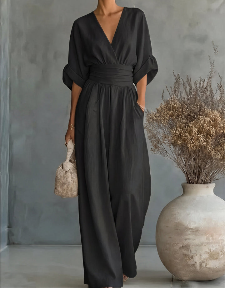 Daniela - Elegante tuta con scollo a V e pantaloni a zampa