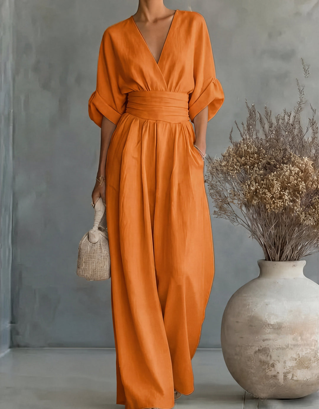 Daniela - Elegante tuta con scollo a V e pantaloni a zampa
