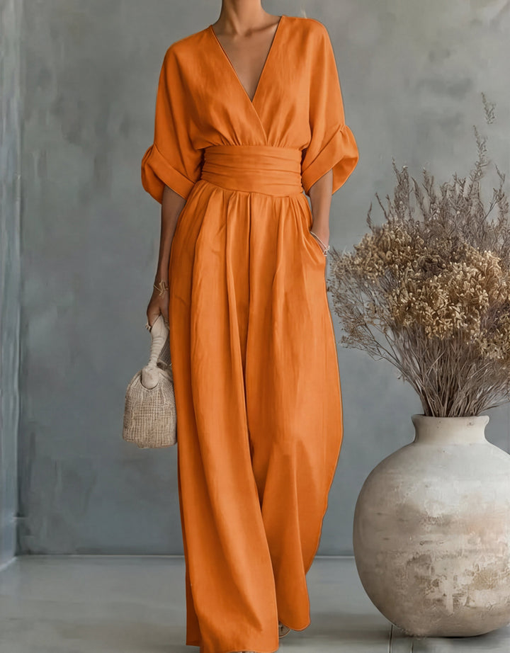 Daniela - Elegante tuta con scollo a V e pantaloni a zampa