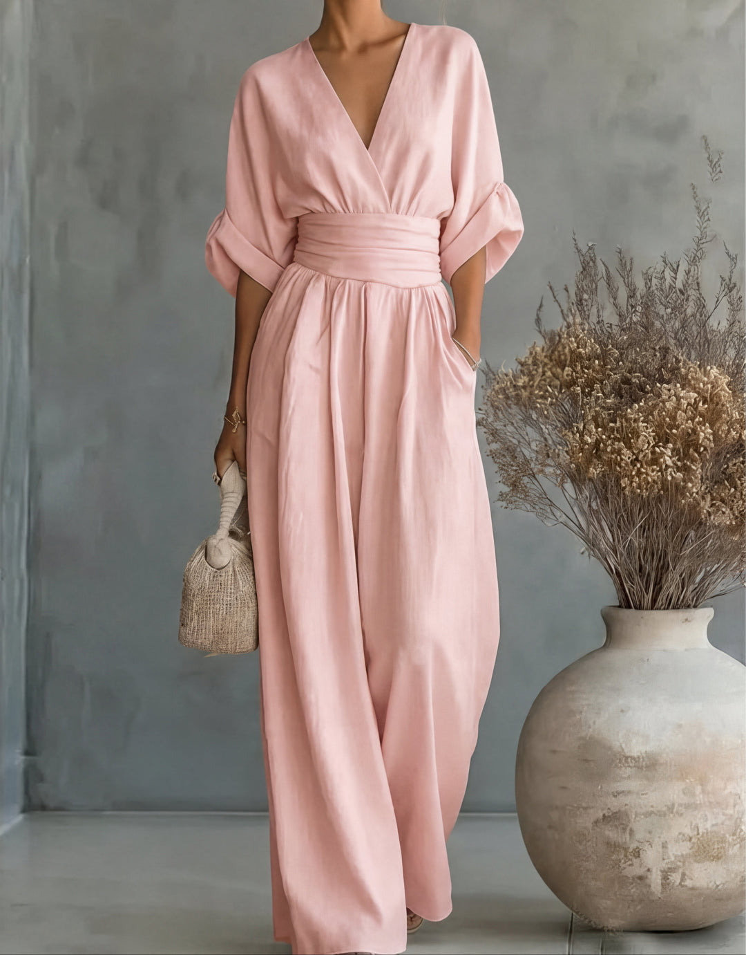Daniela - Elegante tuta con scollo a V e pantaloni a zampa