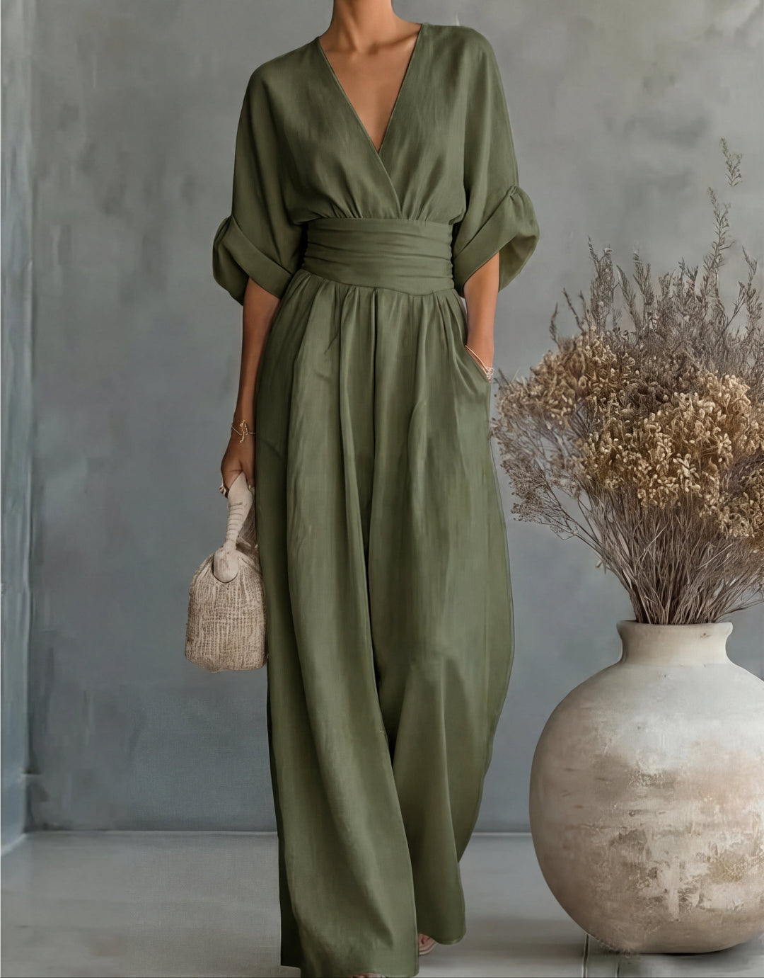 Daniela - Elegante tuta con scollo a V e pantaloni a zampa