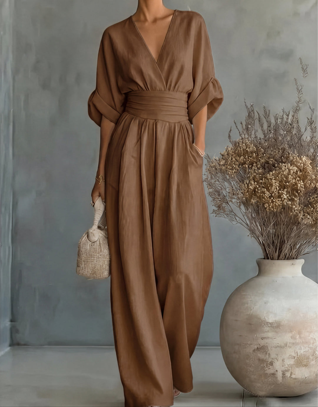 Daniela - Elegante tuta con scollo a V e pantaloni a zampa