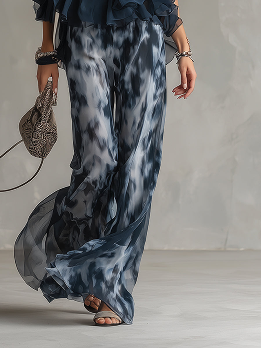 Ludovica - un elegante completo in chiffon composto da una camicetta con collo alto e pantaloni larghi a fantasia