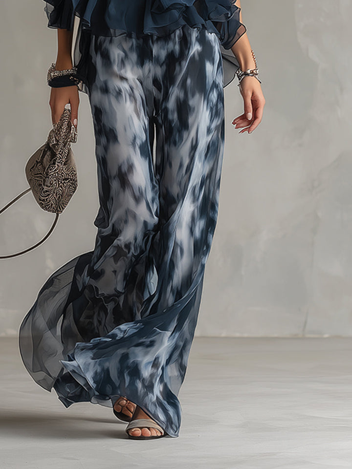 Ludovica - un elegante completo in chiffon composto da una camicetta con collo alto e pantaloni larghi a fantasia