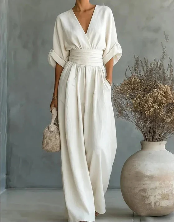 Daniela - Elegante tuta con scollo a V e pantaloni a zampa