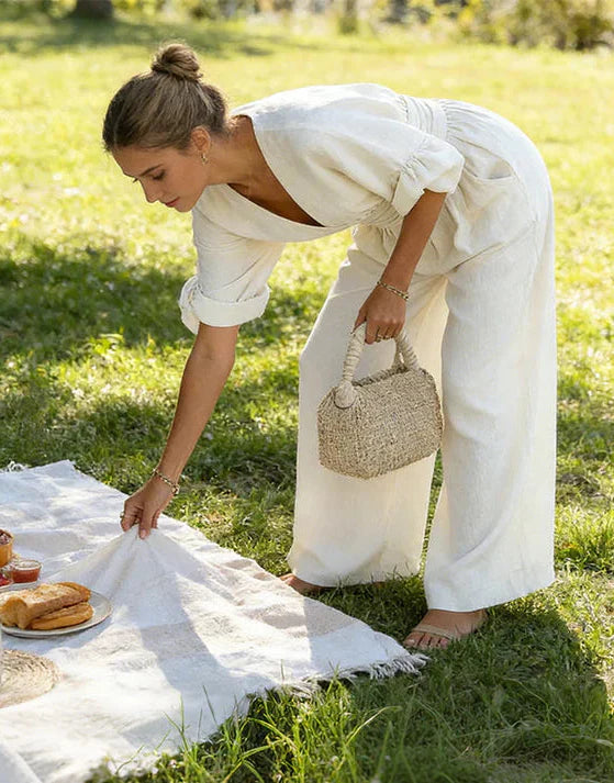 Daniela - Elegante tuta con scollo a V e pantaloni a zampa