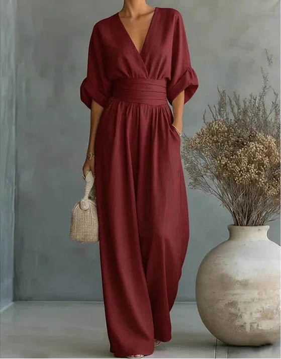 Daniela - Elegante tuta con scollo a V e pantaloni a zampa