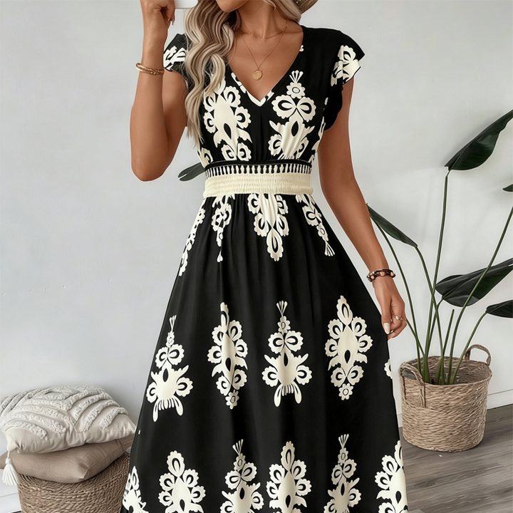 Valeria · Abito lungo in stile barocco con scollo a V