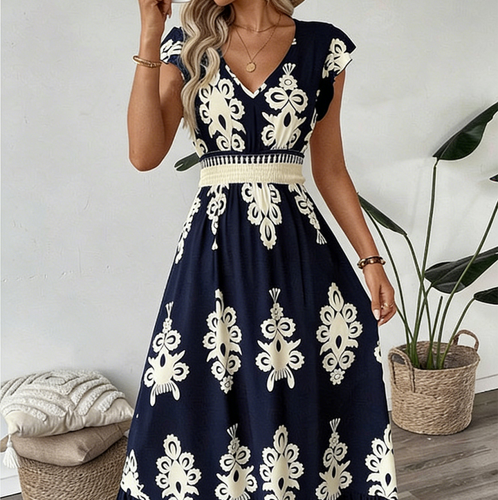 Valeria · Abito lungo in stile barocco con scollo a V